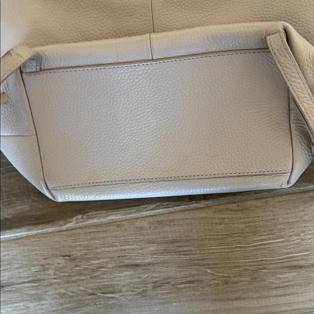 Kate Spade Chester Street Kacy Moussefrost with black accent and tassel backpack